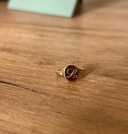 Custom ‘L’ gold signet ring